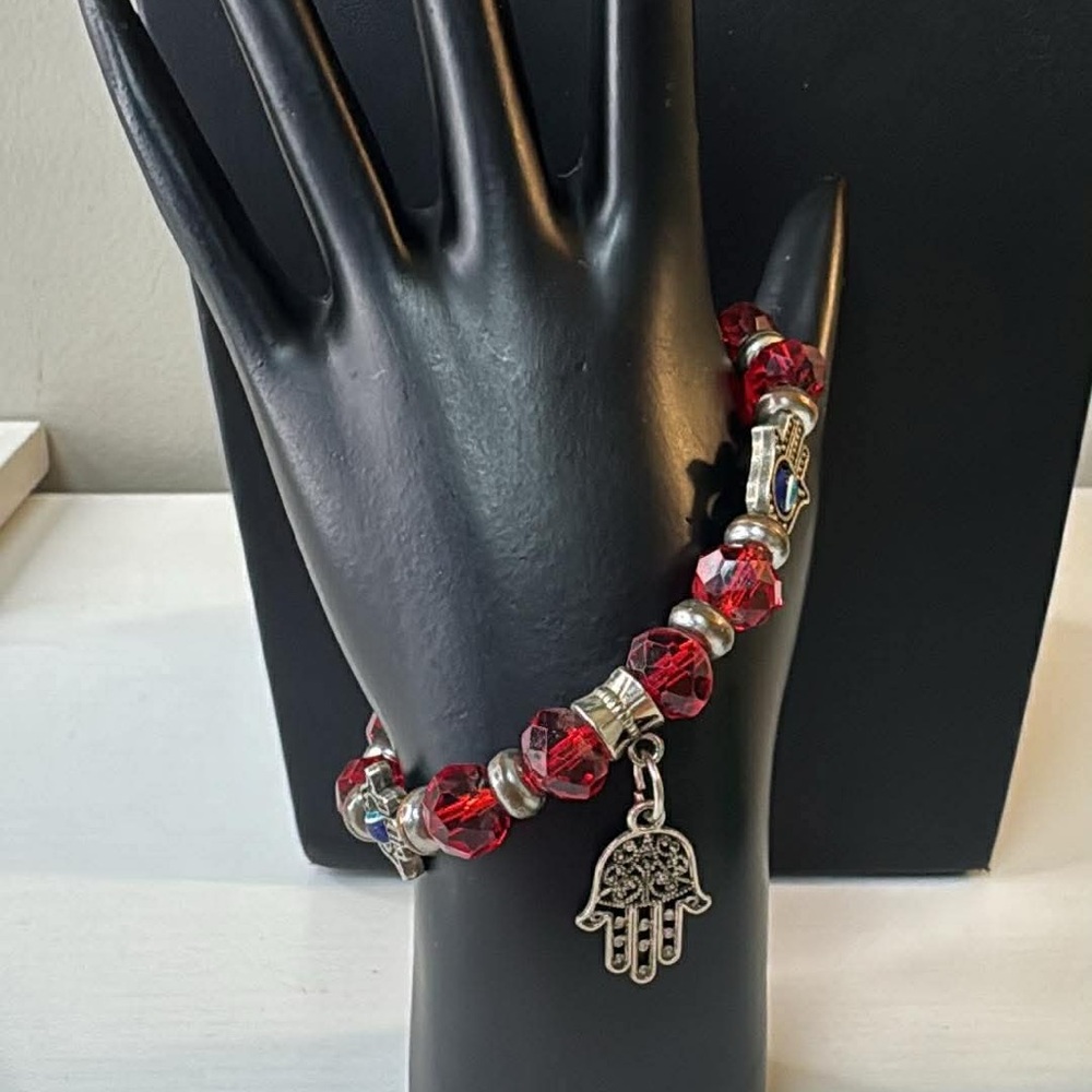red beaded Hamsa Hand and Evil Eye charm stretch bracelet